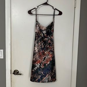 Mini spaghetti strap dress. Back open. Animal print